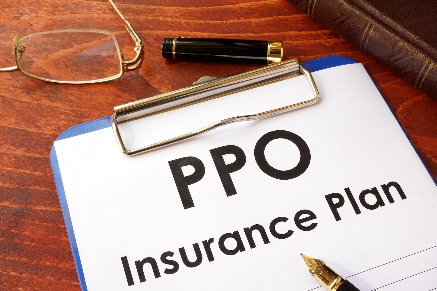 PPO Insurance Plan on clipboard