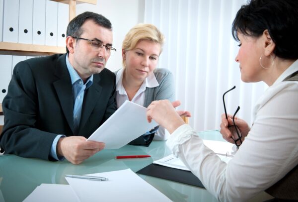 Middle aged couple meeting with financial planner