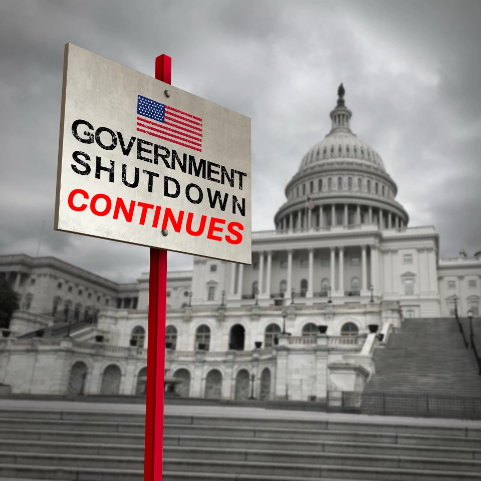 Sign at U.S. Capital that says "Government Shutdown Continues"