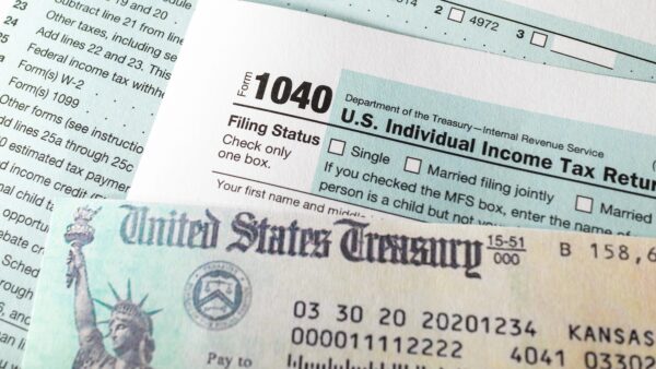 Check, tax return check and 1040 Form.