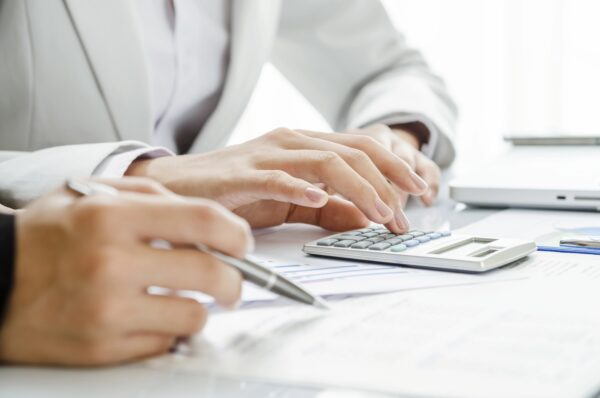 Dentist crunching numbers to make an important decision